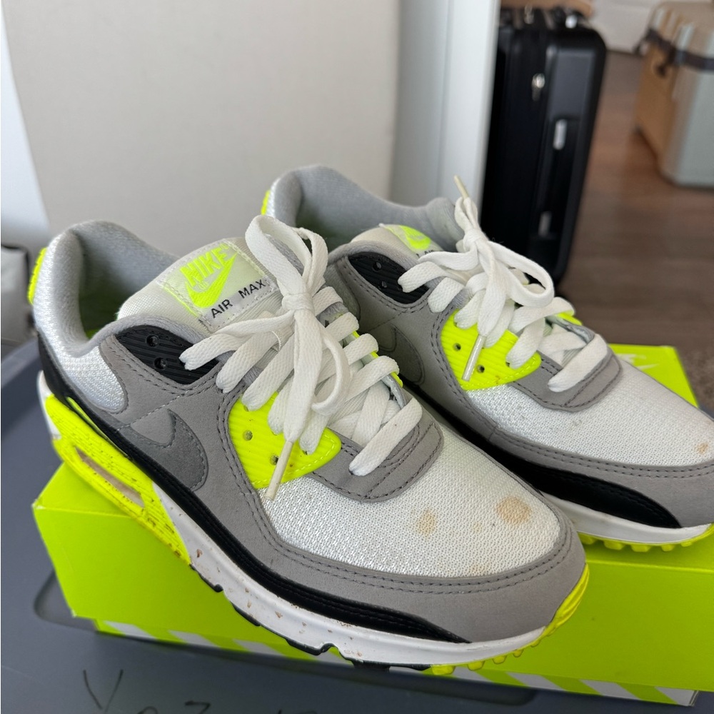 Women’s Nike Air Max 90 "Volt" sneaker in white, gray, and neon green